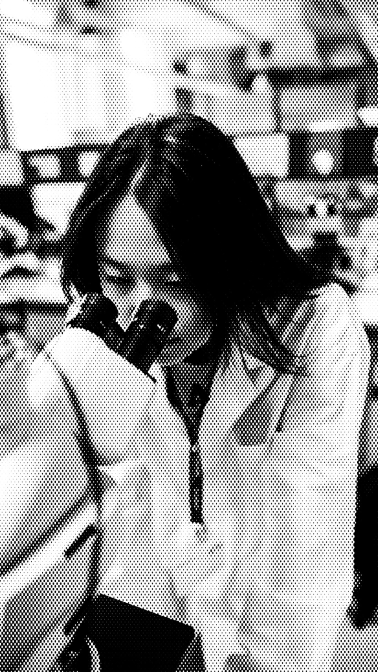 Innovate Summer Academy student with microscope at UCL
