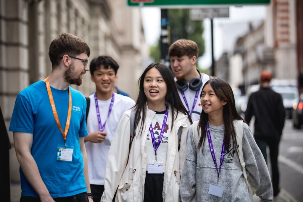 Innovate students and staff walking down the street