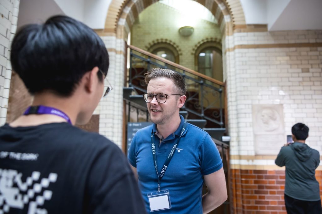 Kevin McNamara, Head of Innovate, in conversation with a student